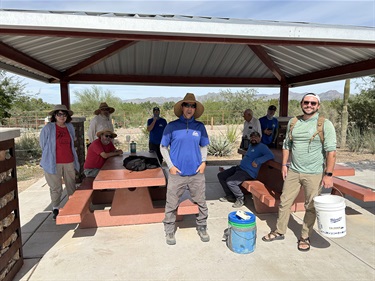 Staff stands for group photo near El Rio Preserve