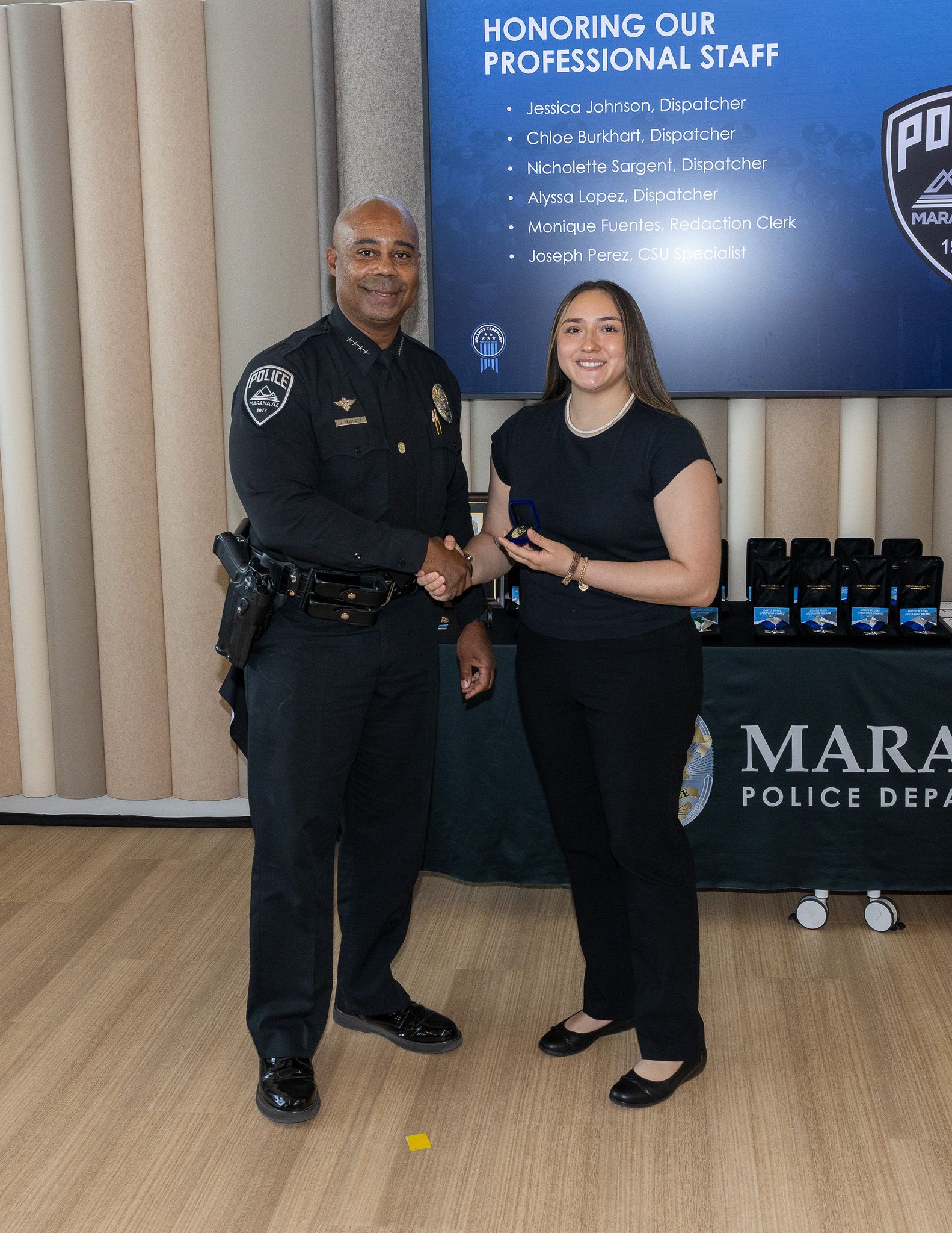 Chief Pridgett with dispatcher Alyssa Lopez