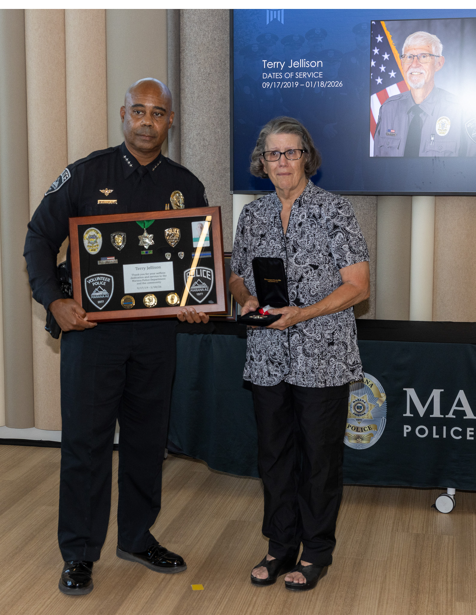 Chief Pridgett with Terry Jellison's wife