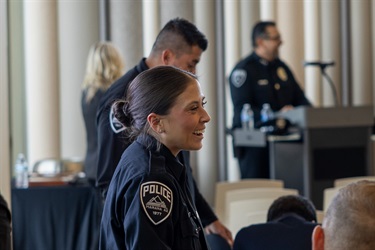 Officer Alvarez smiling during ceremony