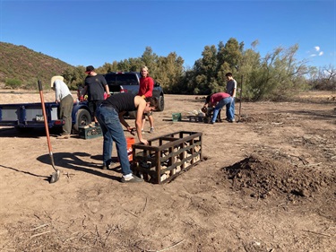 Volunteers and scouts installing new benches