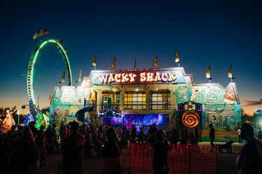 Wacky Shack carnival ride at night