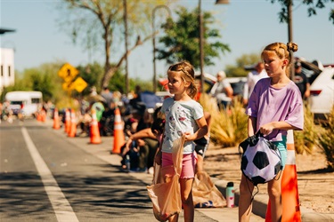 Children gathering candy at the parade