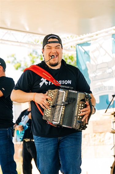 Xplosion singer at Founders Day