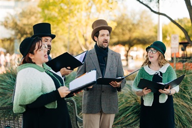 Carolers performing at Holiday Festival
