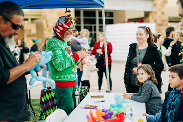 Crafts at vendor during the festival with balloon animals