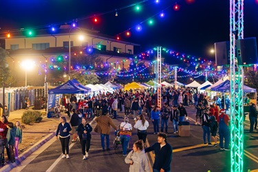 Guests walking Mistletoe Market