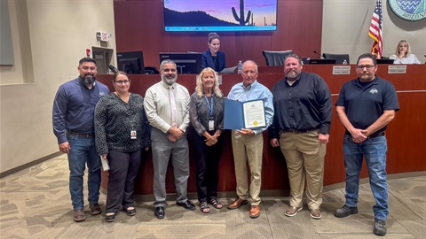 Public Works Team with Mayor Post presenting proclamation