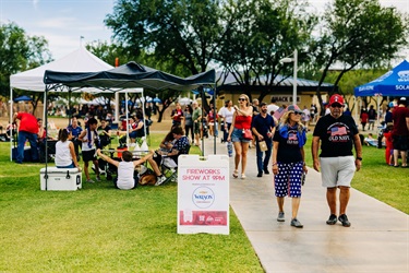 Vendors and guests walking during event