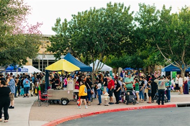 Crowds gathered around food cart at Treat Trail