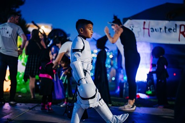 Kid dressed up as a stormtrooper 